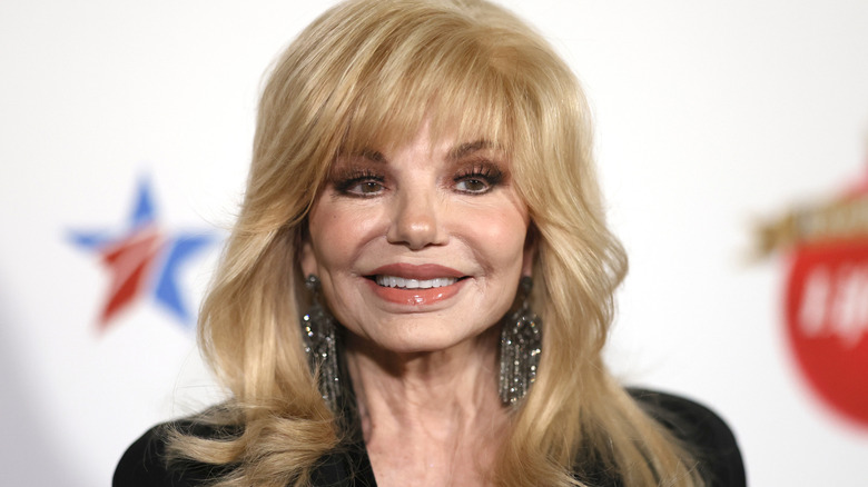 Loni Anderson smiles at event