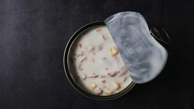 Open can of clam chowder
