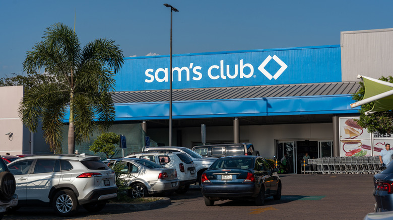 Exterior of a Sam's Club store and parking lot during daytime