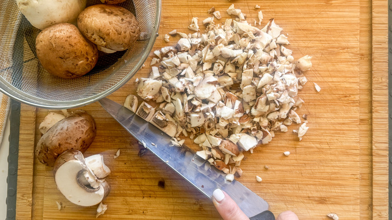 chopped mushrooms on board