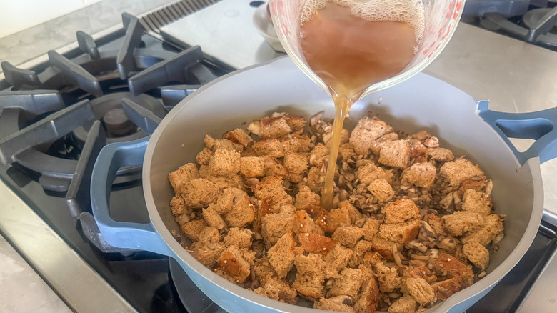 broth being added to pot