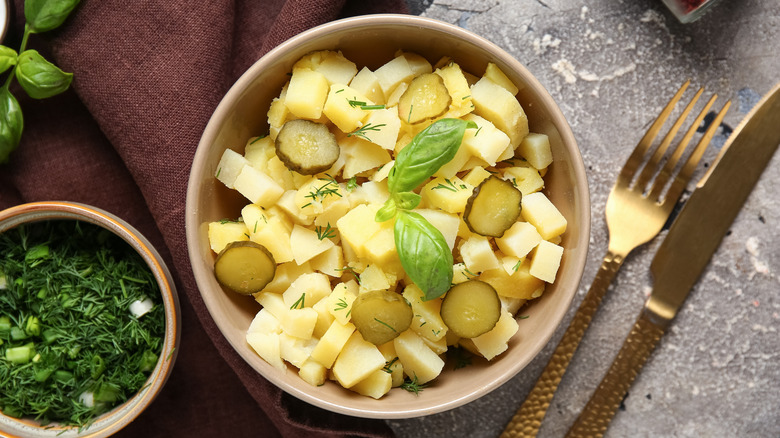 Potato salad with pickles and herbs