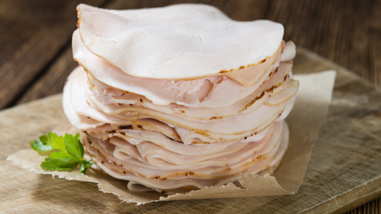 Roast chicken in brown paper wrapping
