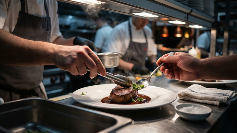 Action in the kitchen of a fine dining restaurant