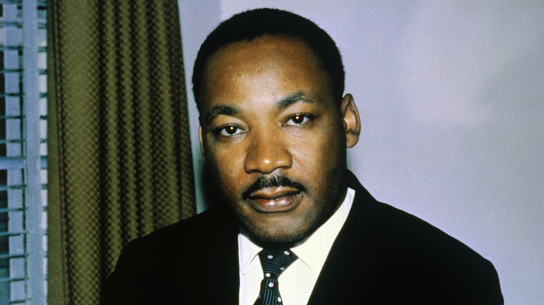 Close-up of the Reverend Dr. Martin Luther King, Jr. against a neutral background