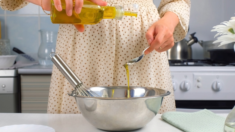 Person making homemade mayonnaise