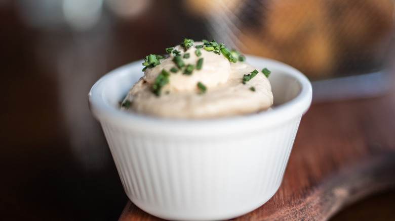 A white ramekin of aioli