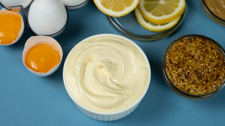 Bowl of mayonnaise with ingredients