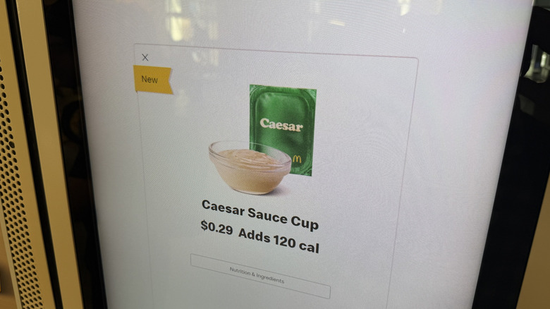 McDonald's kiosk menu screen showing a Caesar sauce cup