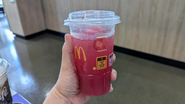 McDonald's Strawberry Watermelon Refresher in hand.