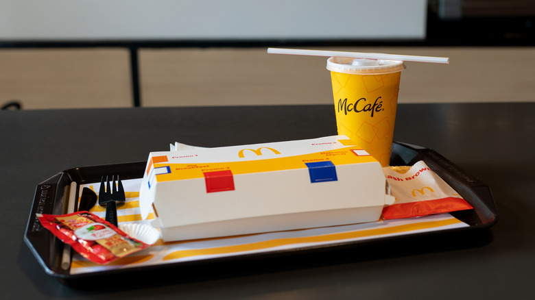 McDonald's breakfast in a box on a tray.