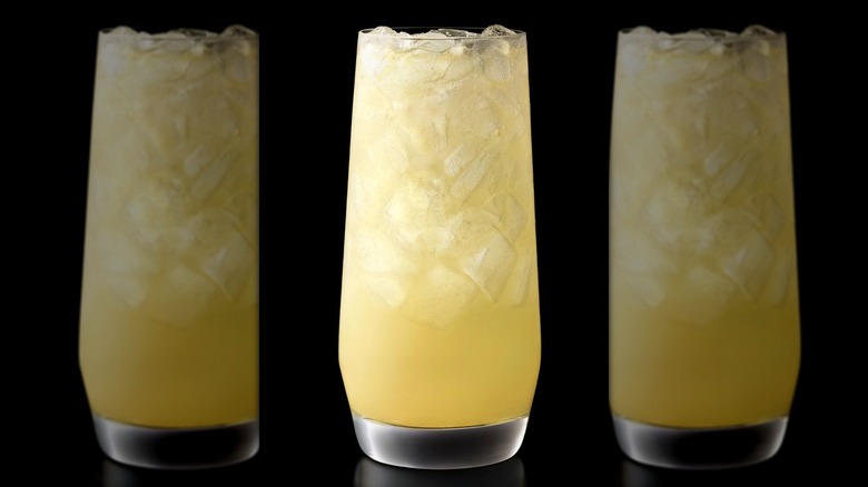McDonald's Lemonade in a tall glass with ice on black background