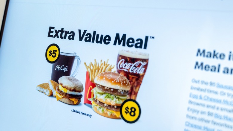 Laptop displaying McDonald's website featuring Extra Value Meal deals