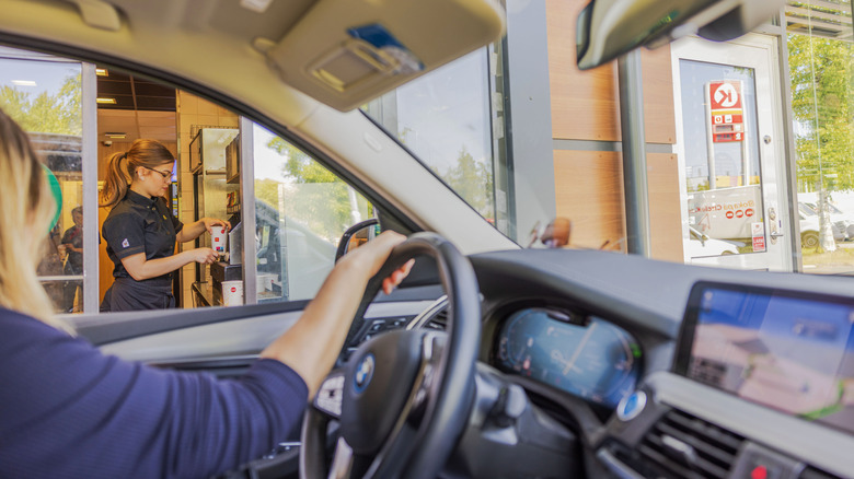 Woman waiting in McDonald's drive-thru line