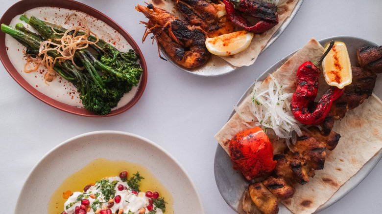 Meat and vegetable dishes at Cleo Miami Beach