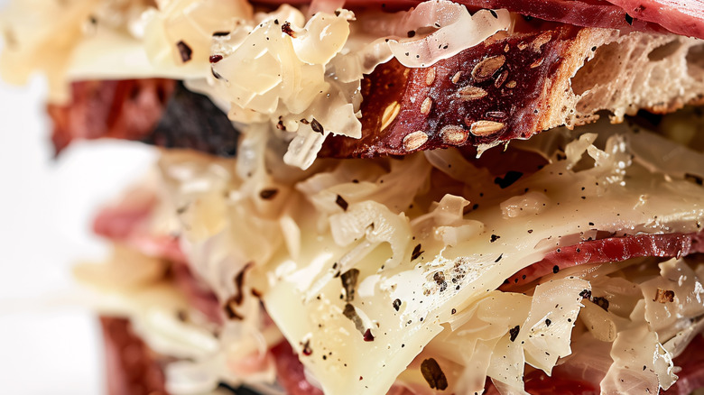 Tight closeup of Reuben sandwich with sauerkraut