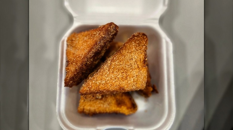 Cheese Frenchee sandwich in takeout box
