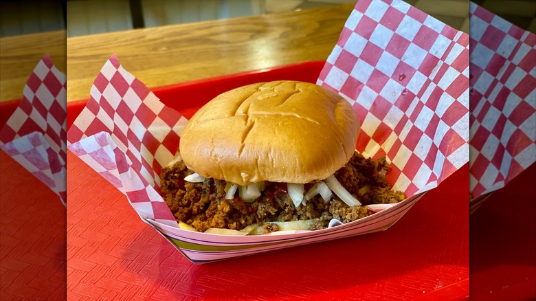 Des Moines, Iowa -2021: The Original Maid: seasoned ground beef loose meat sandwich served on a warm bun. Maid-Rite is an American franchise restaurant chain. Founded by Fred Angell in Muscatine, Iowa