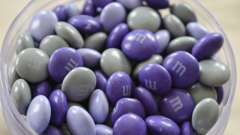 A dish of purple M&M's chocolate candy