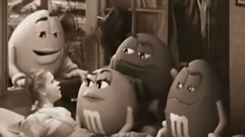 The M&M's "Find their Colors" stunt picturing commercial ad featuring black and white candies and Dorothy from the Wizard of Oz