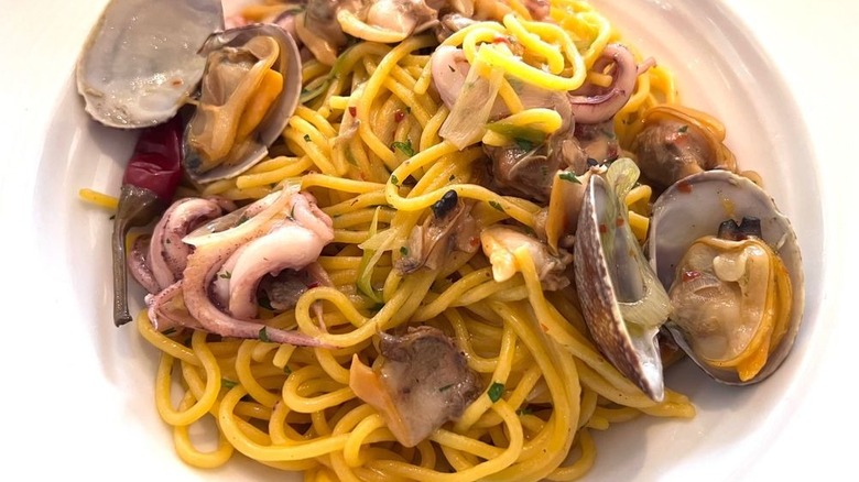 Spaghetti with clams, octopus, and other seafood