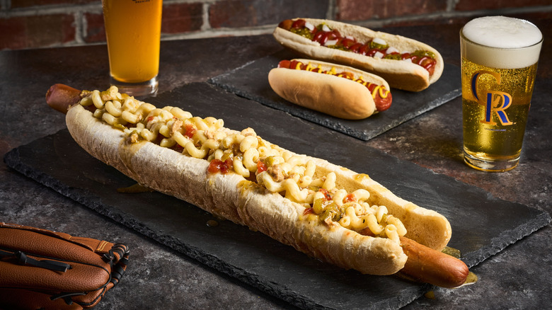 Coors Field's Glizzilla pictured with a pint of beer on the side