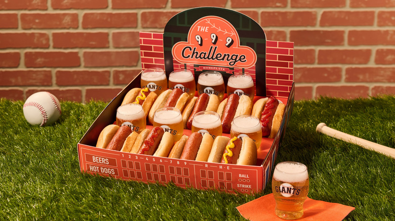 The 9-9-9 Challenge including a box of nine beers and nine hot dogs