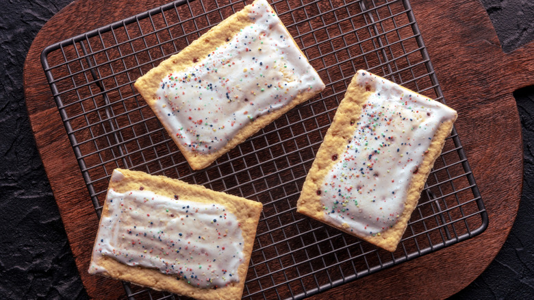 Toaster pastries cooling off on baking rack.