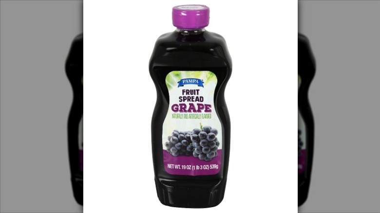 A squeeze bottle of Pampa grape-flavored fruit spread on a white background.