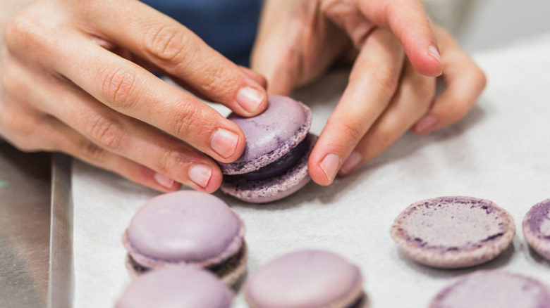 A baker making macarons.