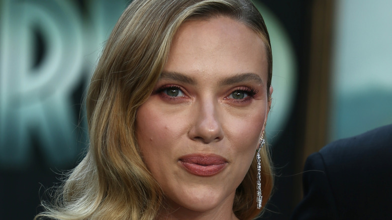 A close-up of Scarlett Johansson's face at the premier of "Jurassic World Rebirth" in 2025