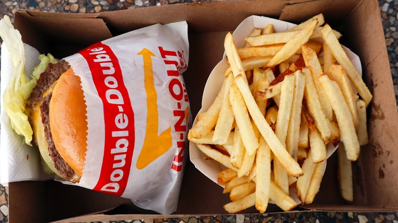 In-N-Out double burger with fries in a brown box