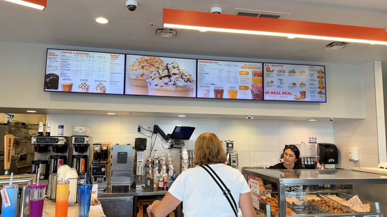 menu inside of a Dunkin' location