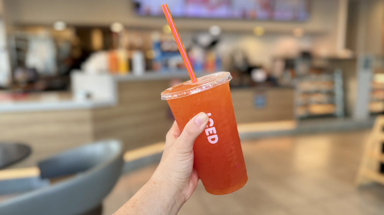 holding a Golden Hour Refresher