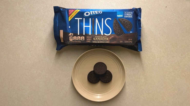 Oreo ganache cookies in the packet and on a plate