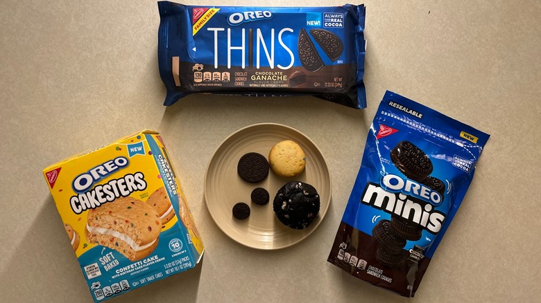 Oreo Thins, Cakesters, and Minis snacks in packaging and some on a plate