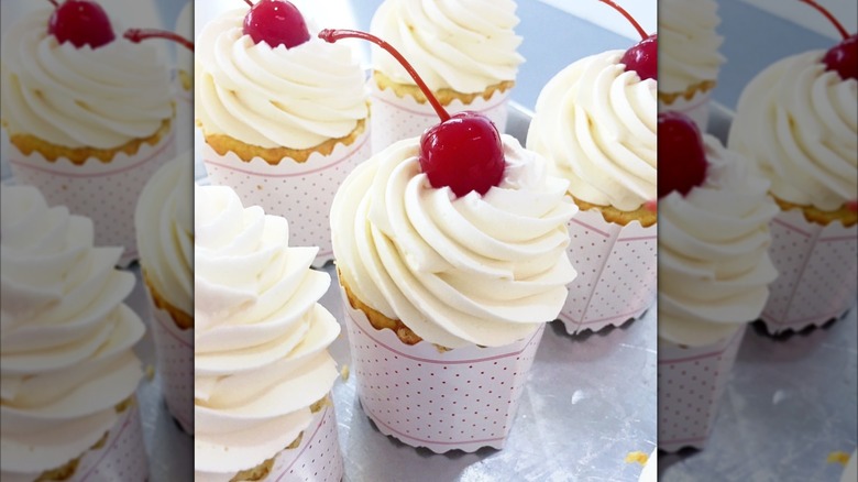 Charlotte Russe desserts with whipped cream and maraschino cherries