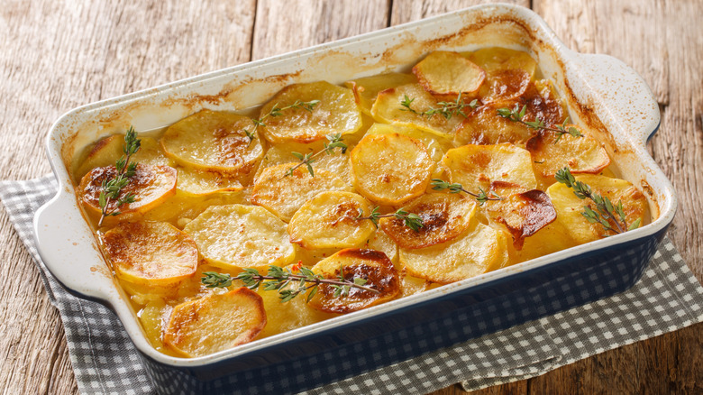 Casserole dish of scalloped potatoes