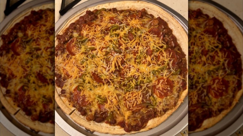 chili pizza with cheddar and jalapeños