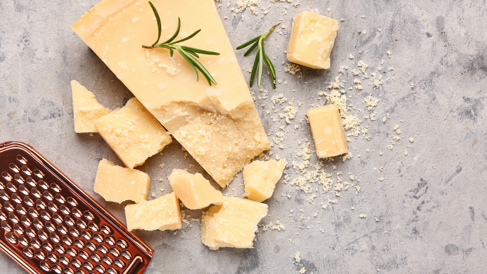 No, Those White Spots On Your Block Of Parmesan Cheese Probably Aren't Mold