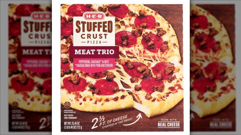H E B Stuffed Crust Meat Trio Pizza on a white background.
