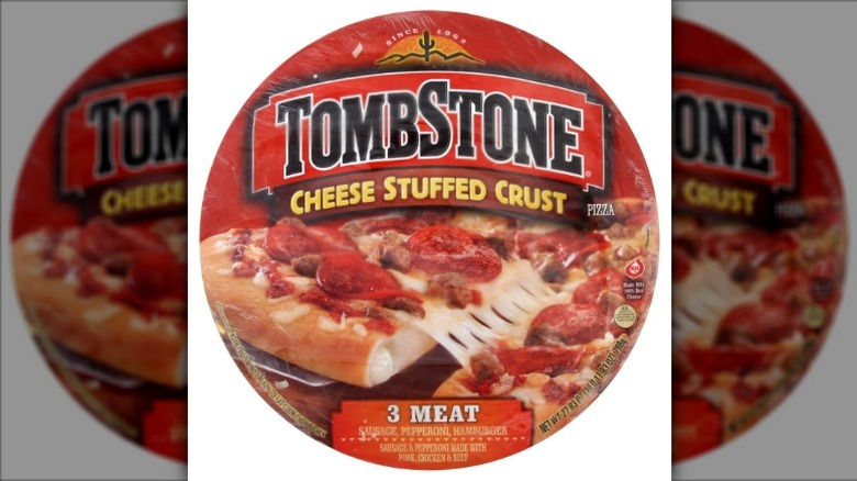 Tombstone Cheese Stuffed Crust 3 Meat Pizza on a white background.