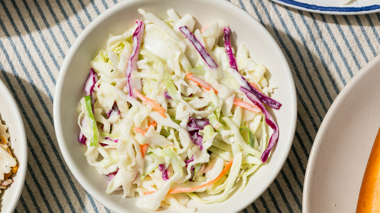 Homemade savory cabbage coleslaw salad with carrots.