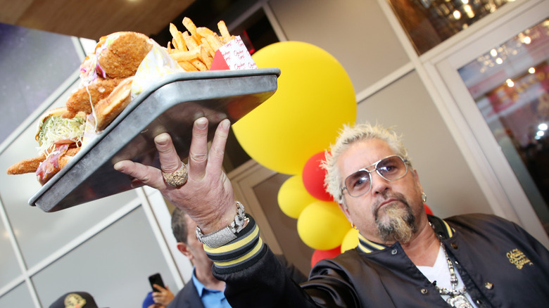 Guy Fieri at the opening of "Chicken Guy"