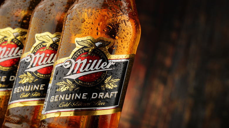 Three ice cold Miller Genuine Draft bottles
