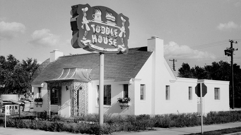 A black and white image of Toddle House exterior