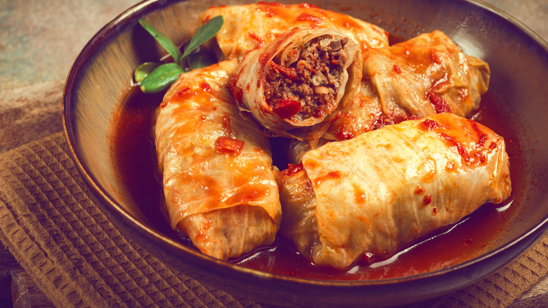 Cabbage rolls in a brown bowl