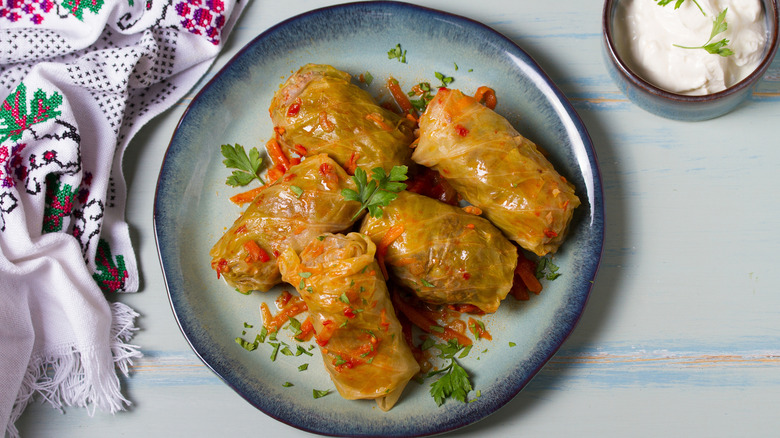 Cabbage rolls on a blue plate