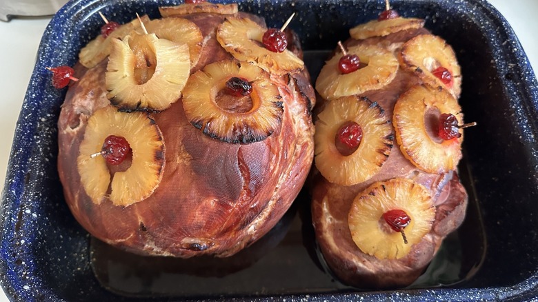 Baked Ham with pineapple glaze and topped with cherries