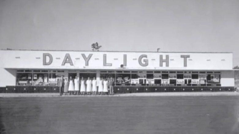 Vintage photo of Daylight grocery store with workers standing in front
